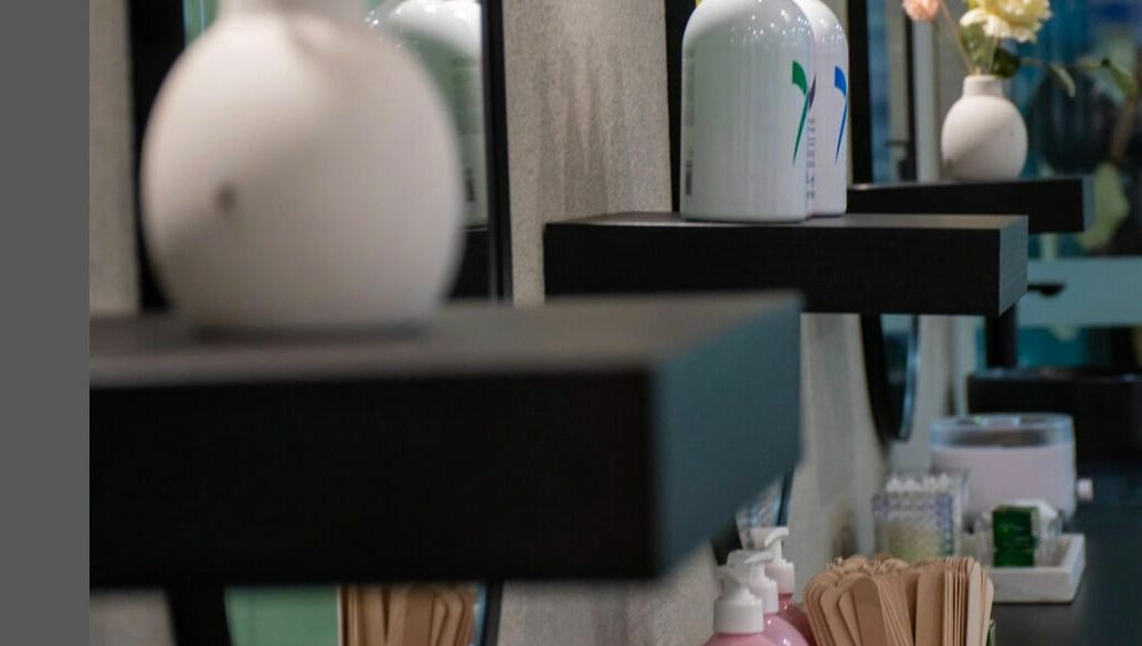 Studio shelf with candles and decor